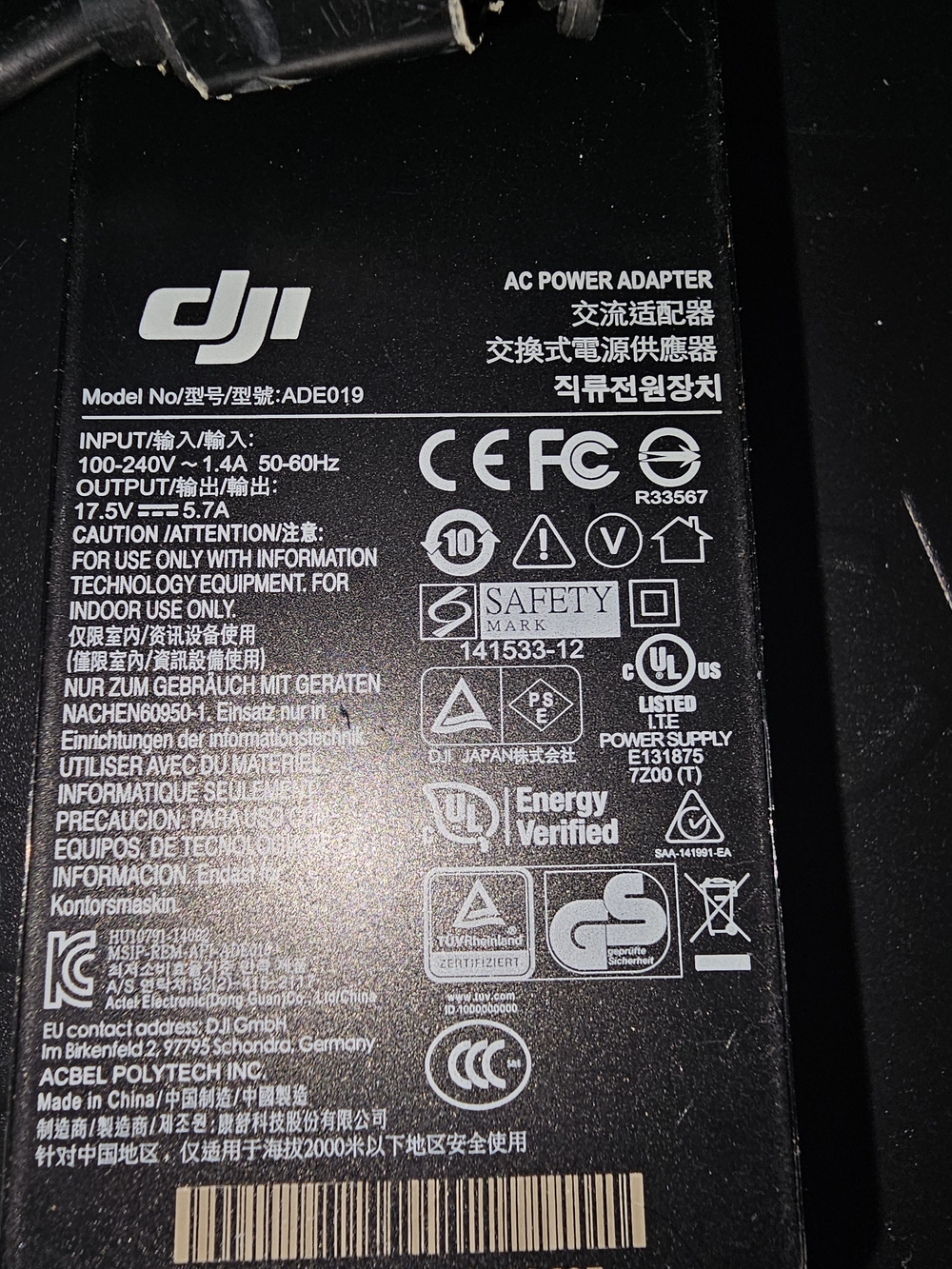 DJI Power Adapter with Black Cables and Gold Contacts